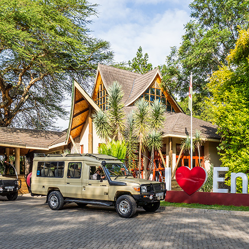 Entrance of Enashipai Resort and Spa with safari vehicle
