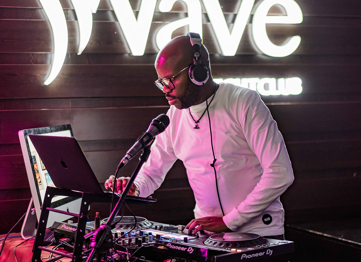 DJ performing at nightclub at Wave NightClub
